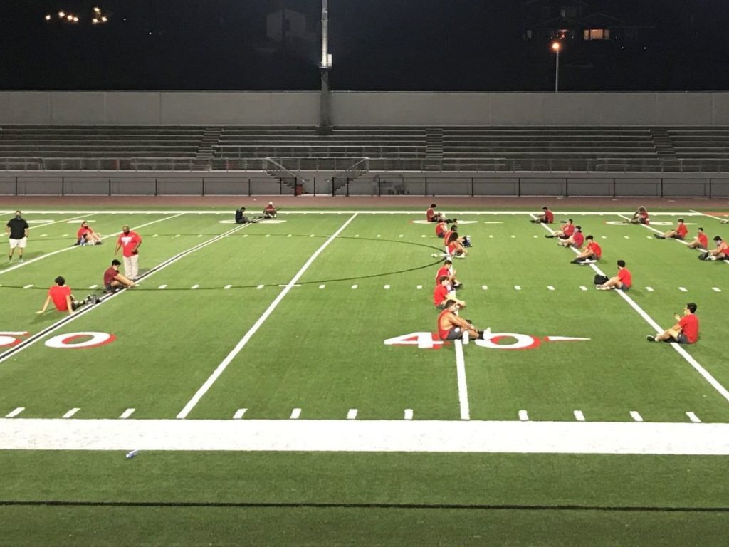 Fullerton football players remain enthusiastic and dedicated preparing