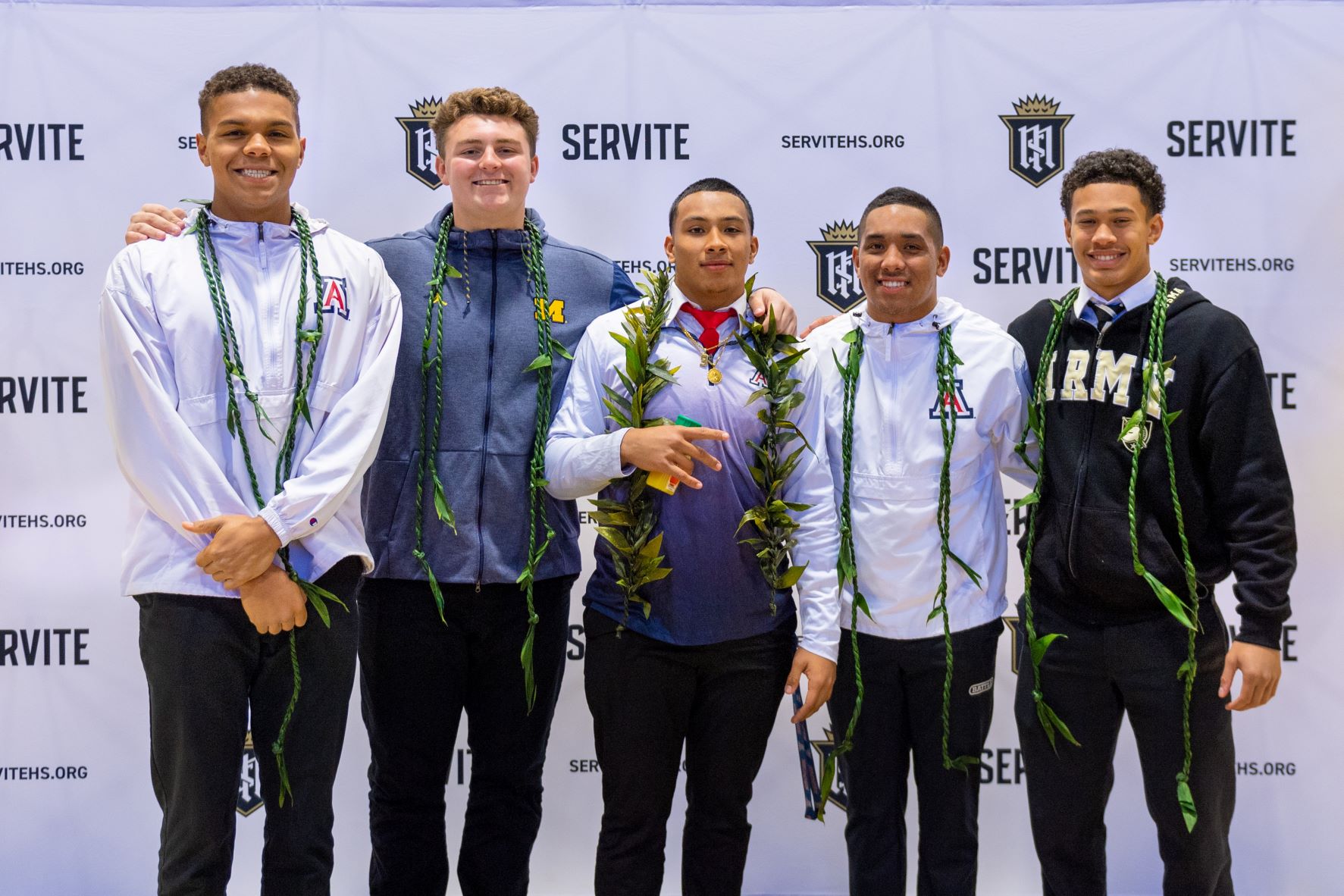 Five Servite football players sign national letters of intent