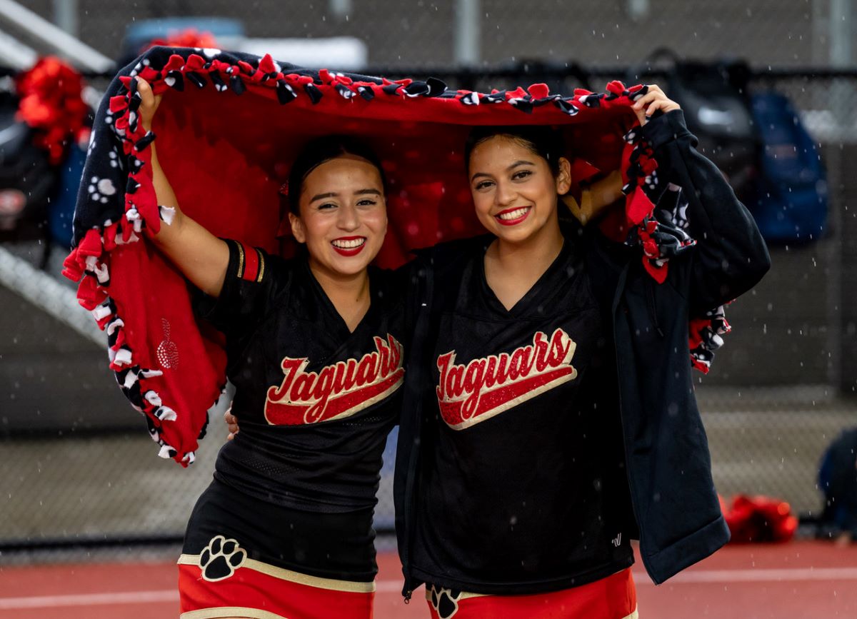 Cheer squad fosters spirit for fans, players, Sports