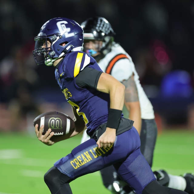 Crean Lutheran QB Caden Jones scramble for a first down Friday night