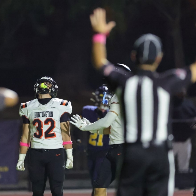 Huntington Beach runningback Nathan Villanueva celebrates a touchdown