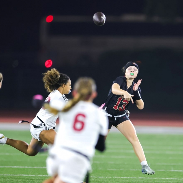 JSerra QB Kate Meier evades OLu defenders