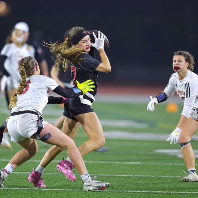 Jserra receiver Tessa Russell catches the ball for a first down