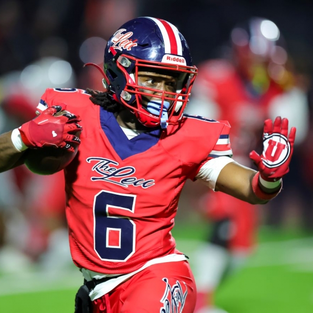 Leuzinger runningback Kelton Strickland evades defenders