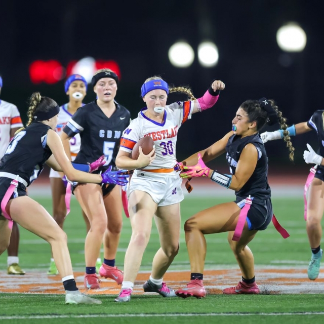 Westlake QB Annabel O’Keefe advances the ball