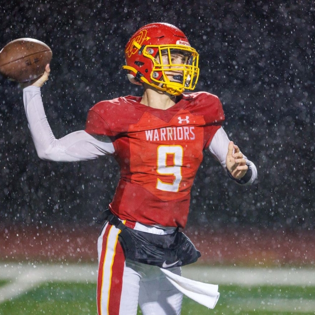 Woodbridge freshman quarterback Waylon Stone spots a receiver down field