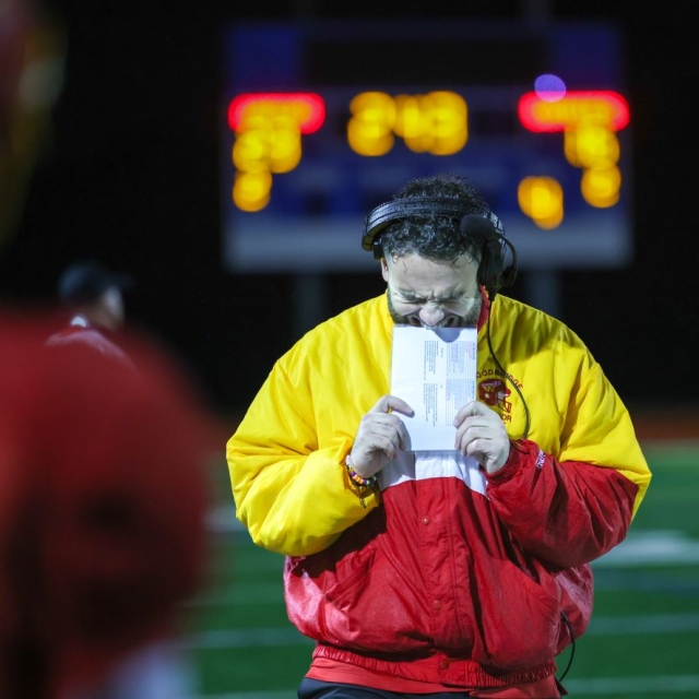 Woodbridge head coach Conner McBride reacts to the pressure late in the fourth quarter