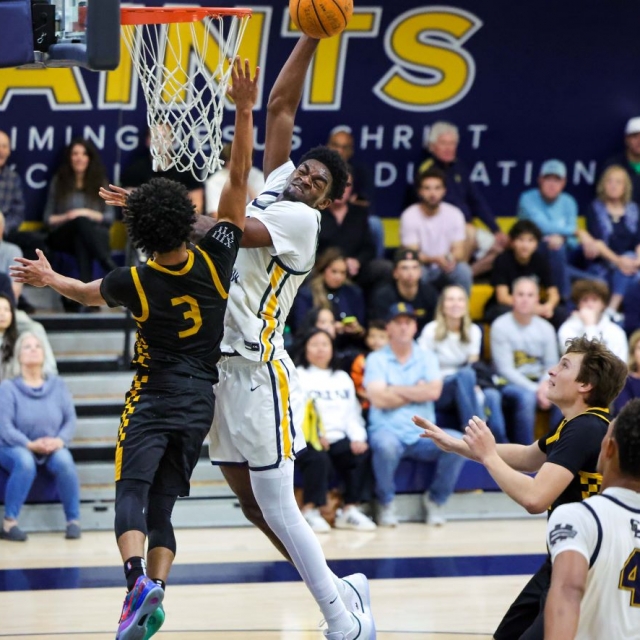 Crean Lutheran’s Chadrack Mpoyi attempts to score as Braeden Davidison of Foothill defends