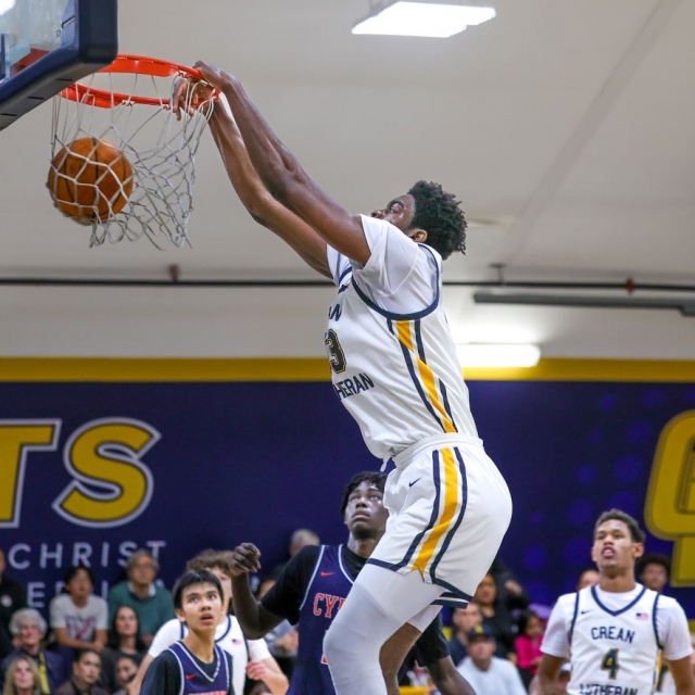 Crean Lutheran’s Chadrack Mpoyi scores to rally the Saints early in the second half