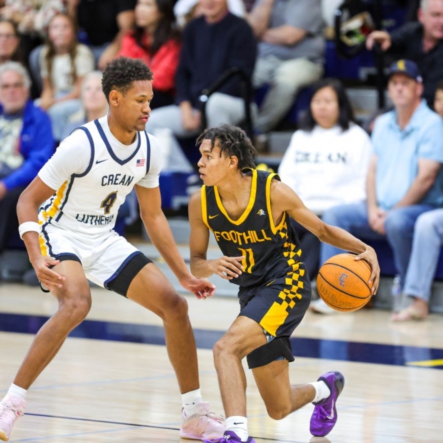 DeAngelo Todd of Foothill advances the ball as Crean Lutheran’s Bryce Coleman defends