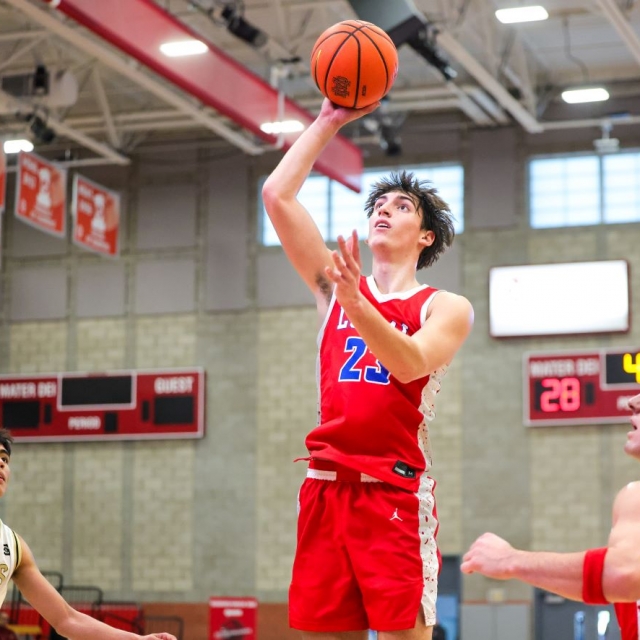 Los Alamitos senior Tyler Lopez takes an open jump shot