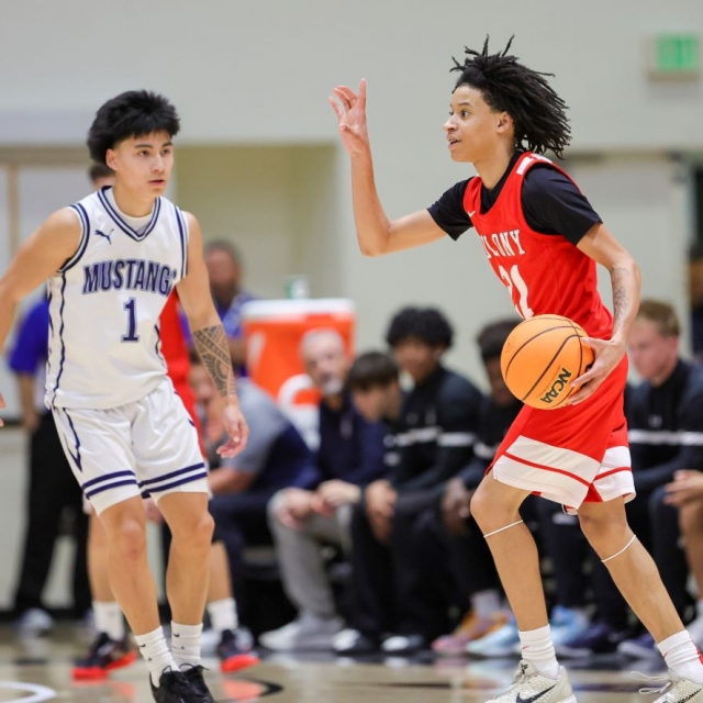 Colony’s Destin Strauther calls a play as Isaiah De Lorez of Trabuco Hills defends