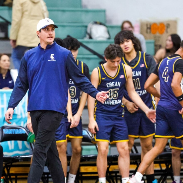 Crean Lutheran Head Coach Austin Loeb paces the sideline during overtime play