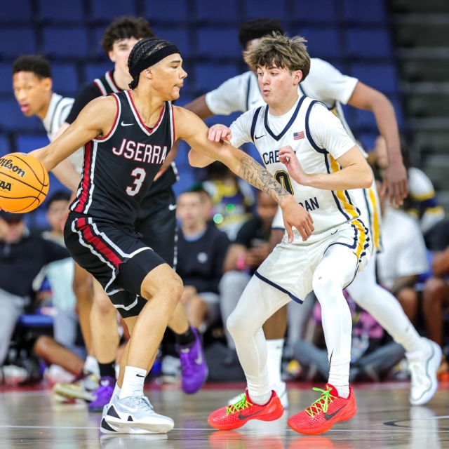 JSerra’s Earl Bryson attempts to drive around Caden Jones of Crean Lutheran