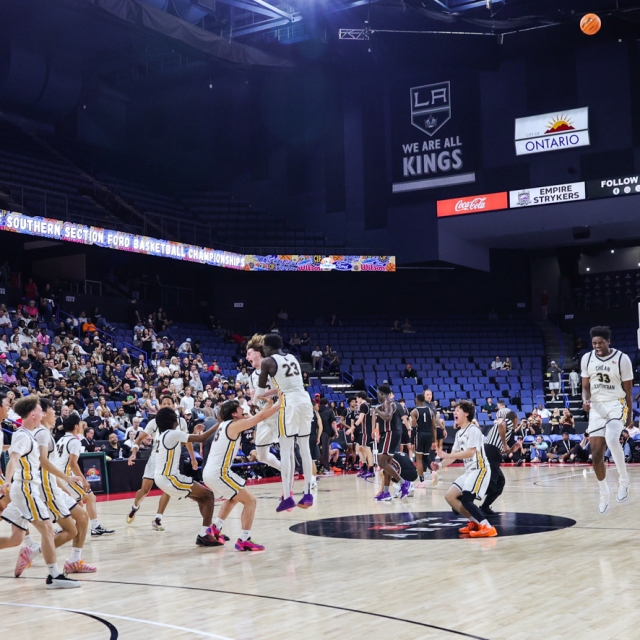 The Crean Lutheran Saints celebrate as time expires