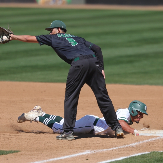 Henry Garcia of Rancho Alamitos attempts a pick off at first base