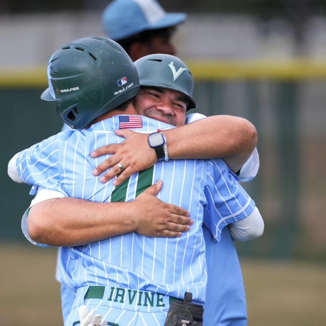 Irvine head coach Gabriel Cota embraces Jack Dressendorfer postgame