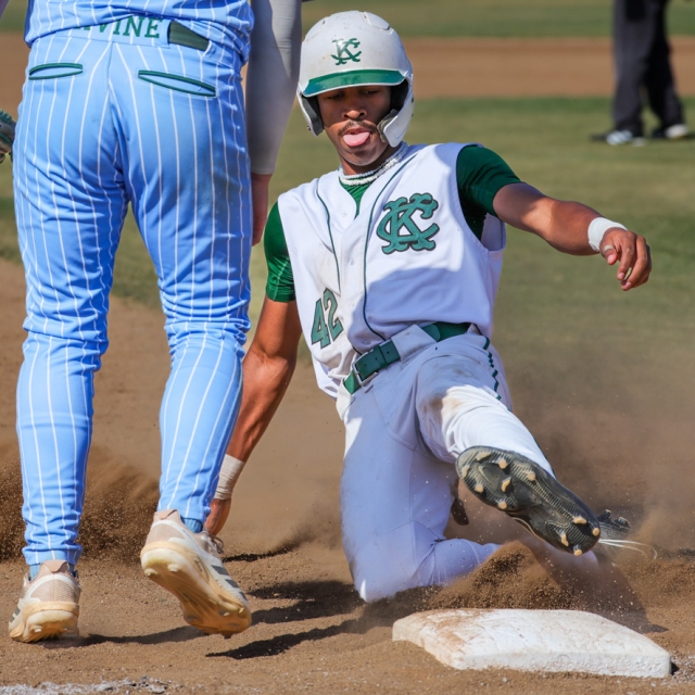 Kaiser’s Jaiden Brooks slides into third base