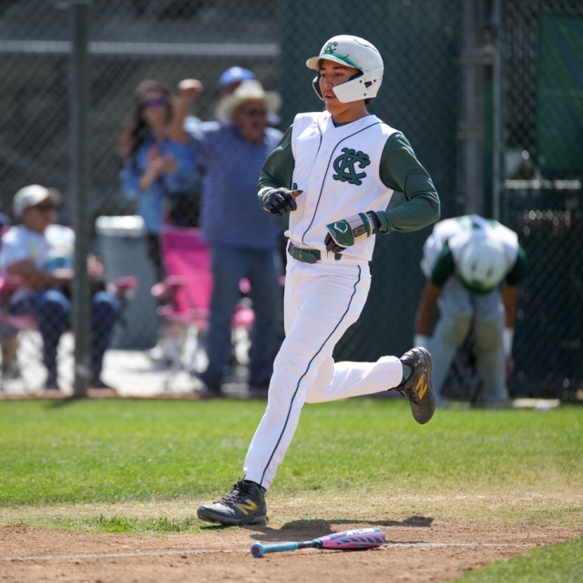 Kaiser’s Joey Chavez crosses the plate