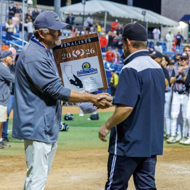 Laguna Beach is presented with the Finalist plaque after the game