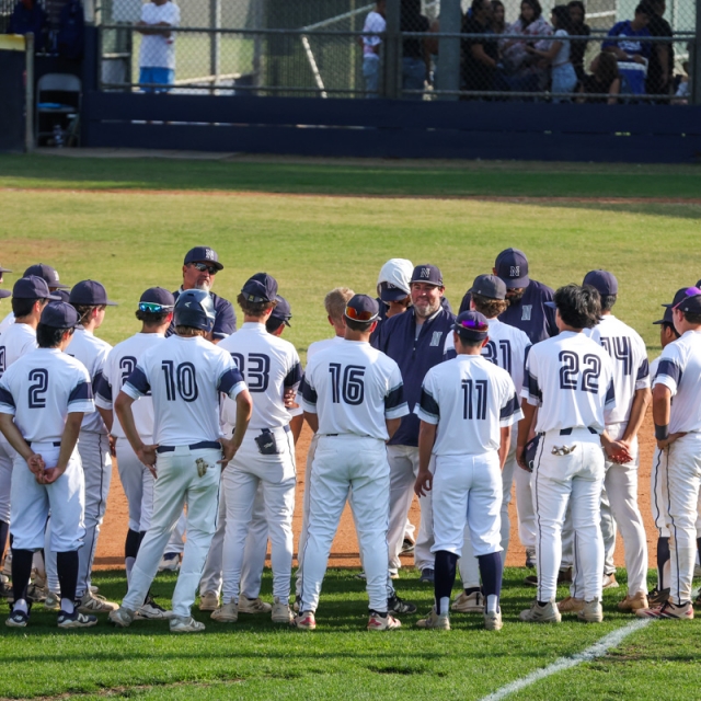 Northwood head coach Ben Owens talks to the team after the game