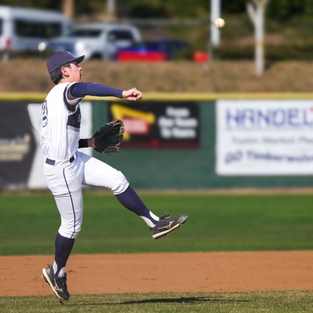 Northwood’s Ethan Tsou throws the ball to first base
