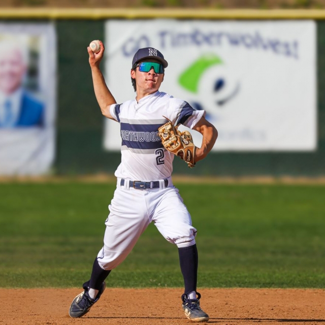 Northwood’s Kai Tsuneshige throws the ball to first base